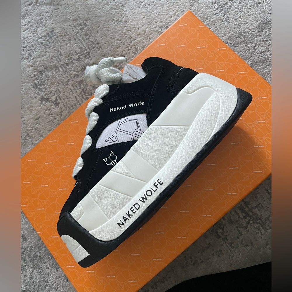 “Snatch Black” sneakers from Naked Wolfe.